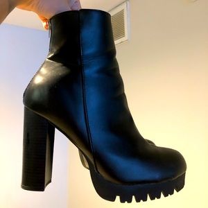 Heeled black booties